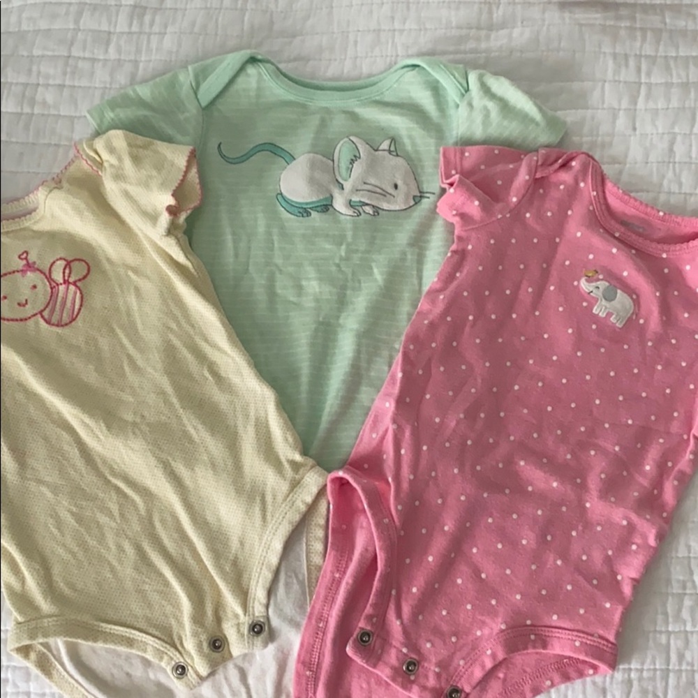 3  cute snap onesies . 2 carters and 1 Gymboree